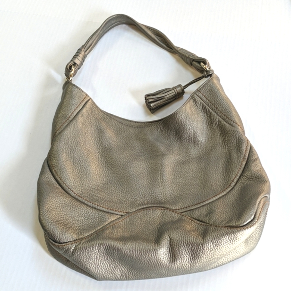 Sabrina Scala, metallic bronze leather shoulder bag.